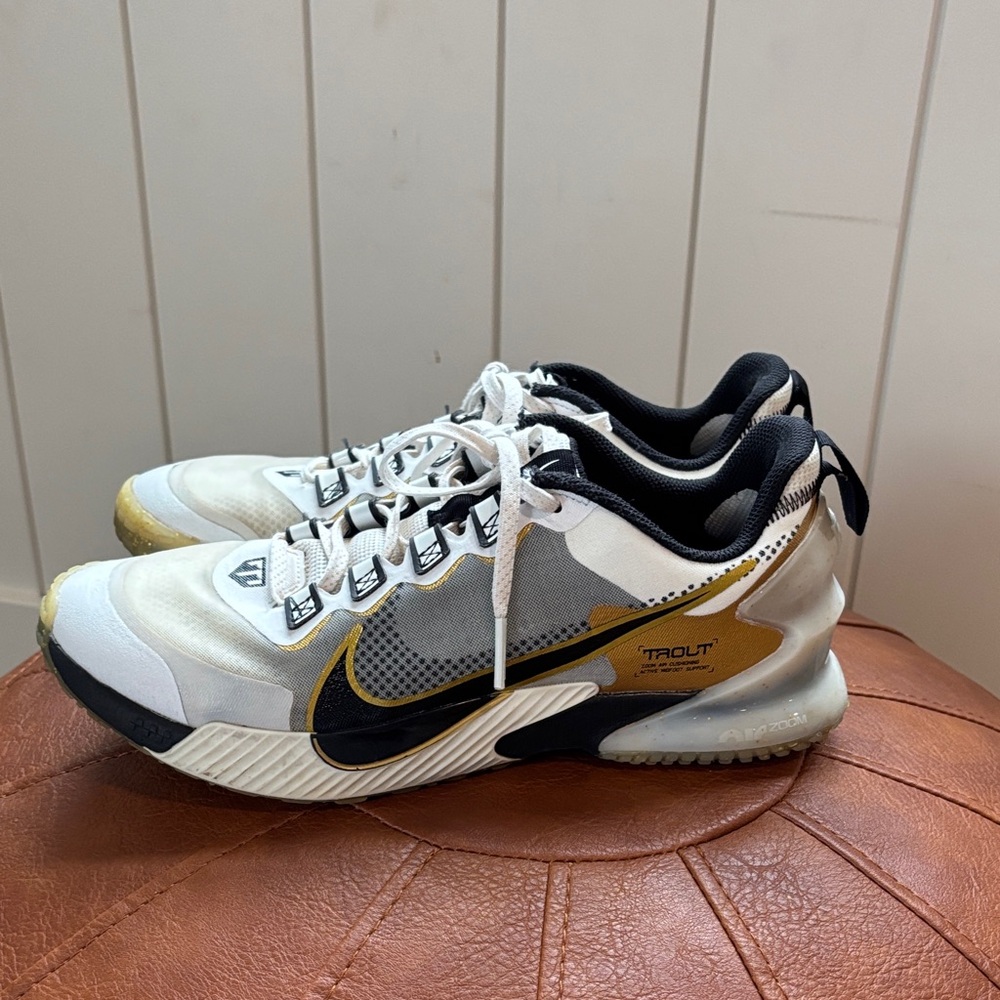 Nike Force Zoom Trout baseball turfs, gold, white, black.
